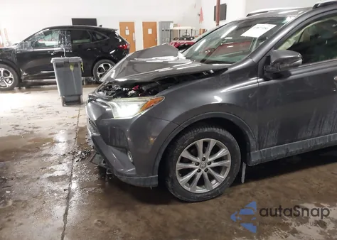 2016 Toyota Rav4 Limited z USA, uszkodzony, nr VIN JTMDFREV4GJ100454